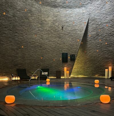 Grand Hyatt’s Cenote Spa relaxing room and warm water pool